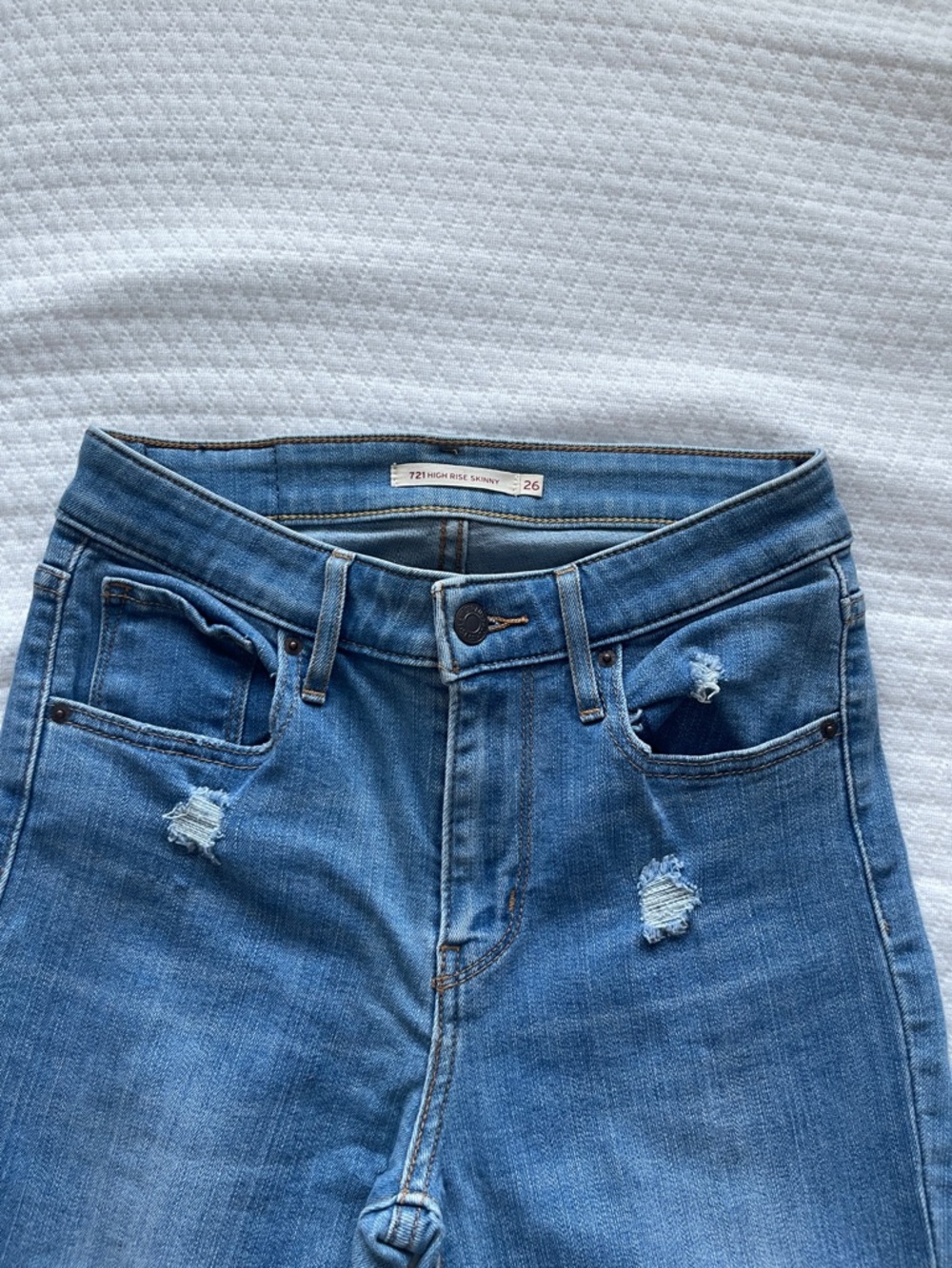 Levi's High-Rise Skinny Jeans in Medium Blue with Light Distressing